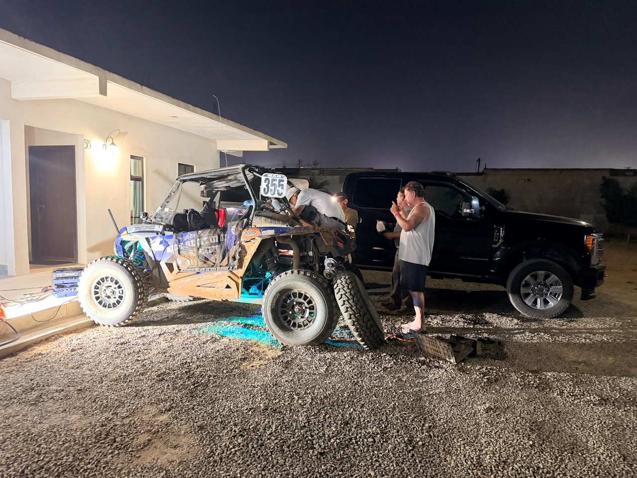 Team members completing Race Day 1 service on car 355