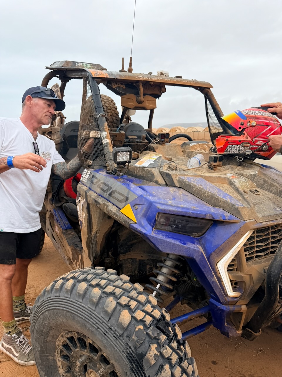 High Altitude Racing crew cleaning sand and salt from equipment