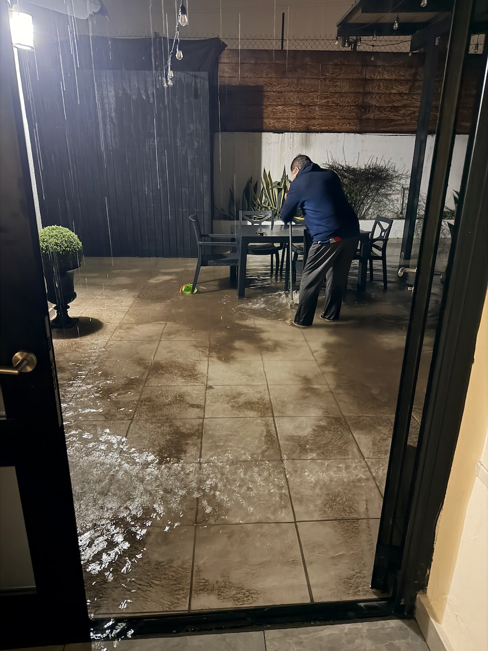 Standing water inside the rental house and garage