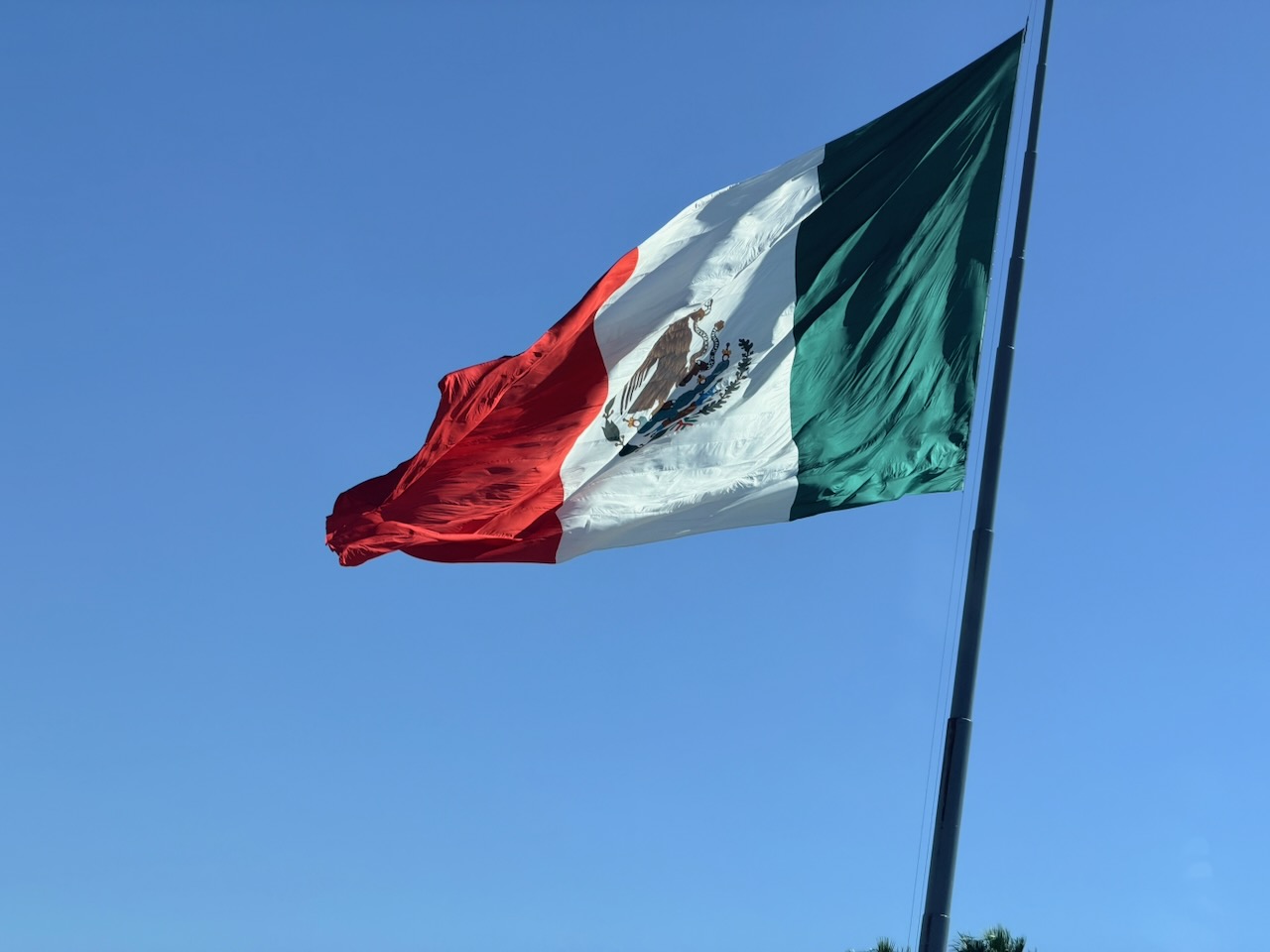 Mexican flag flying in Ensenada during NORRA 500 race week