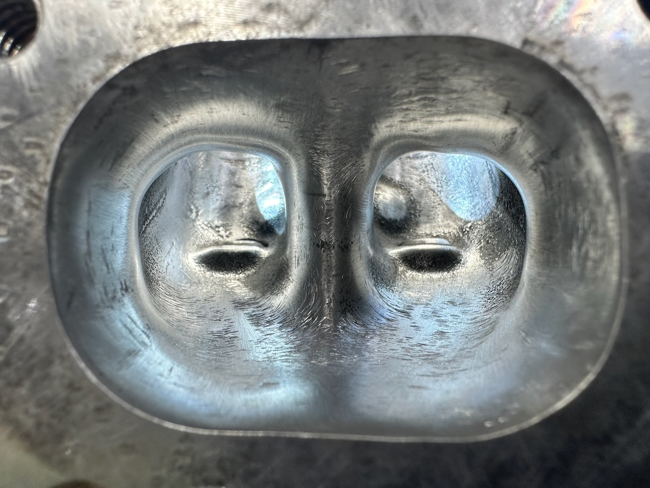Cleaned exhaust port after removal of melted desert dust deposits