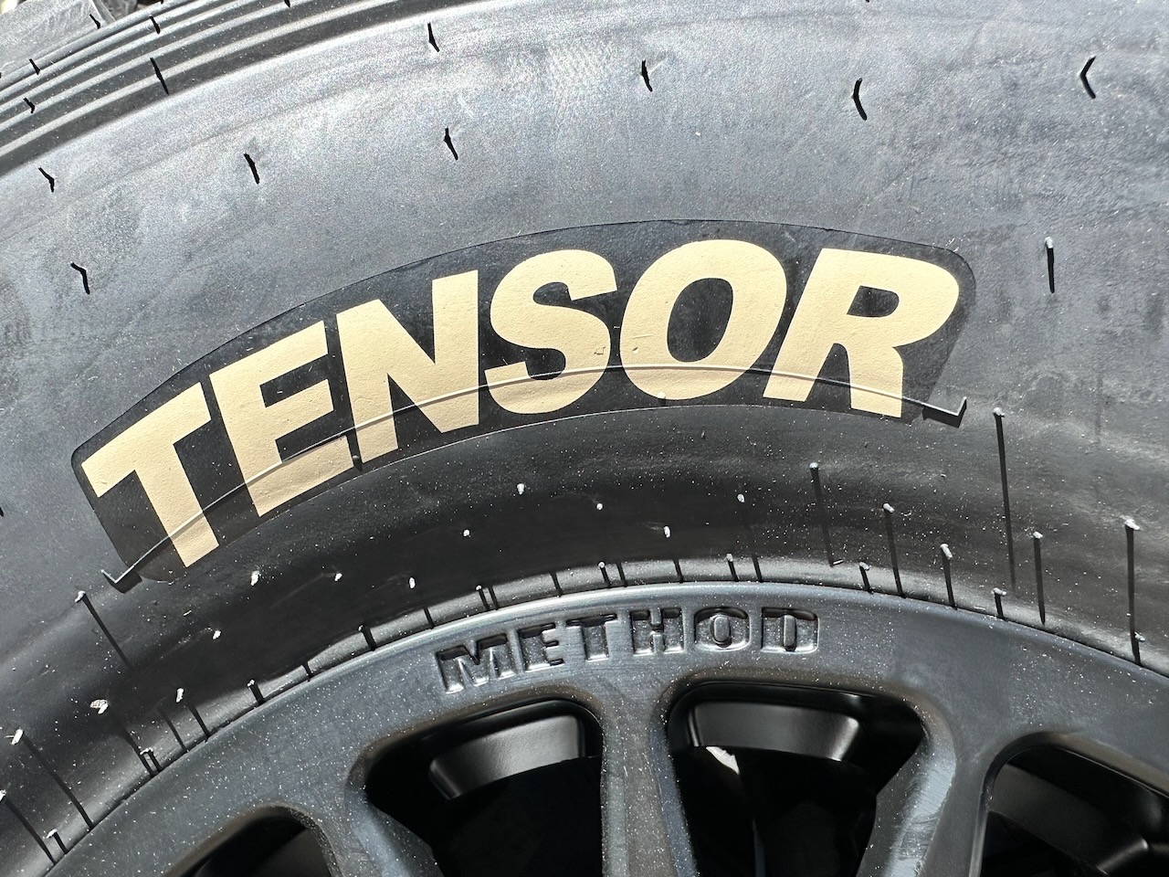 Tensor Tires sponsor lettering on a Method Race Wheel