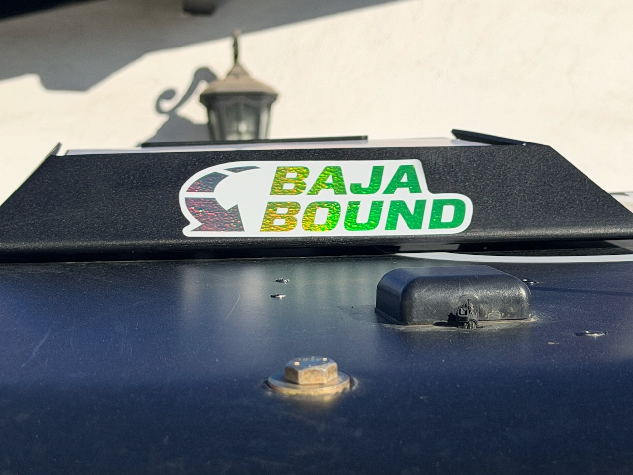 Baja Bound roof sponsor sticker on race car 355