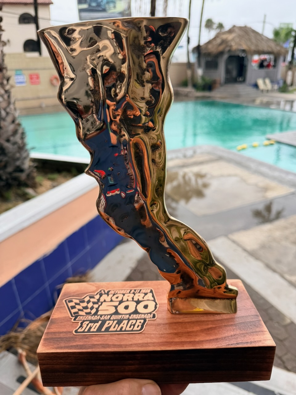 Polished Baja Peninsula-shaped 2026 NORRA 500 third-place trophy won by car 355